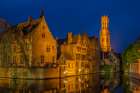 Belgium-Bruges. Buildings reflect in canal at twilight. Coastal Print